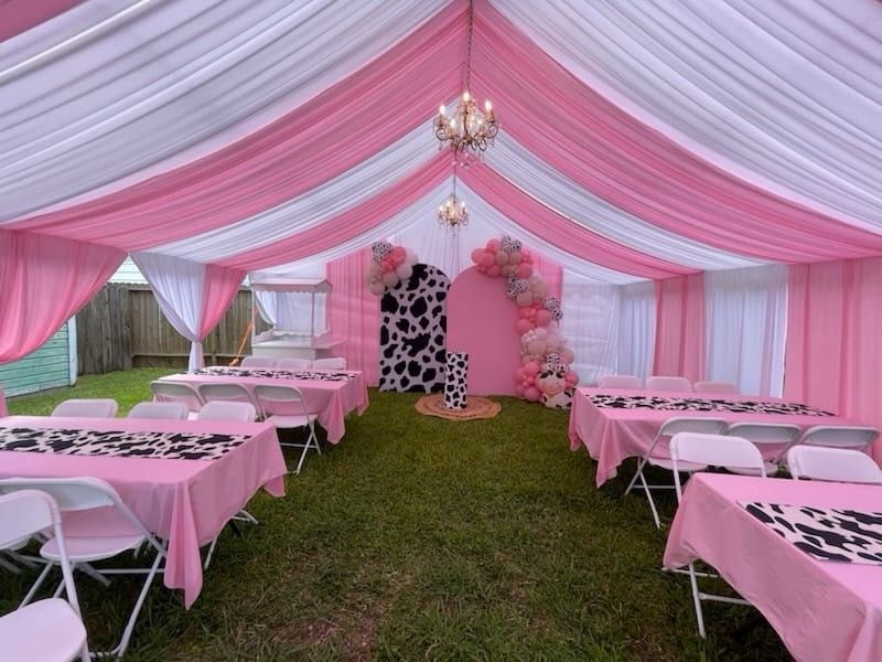 Coordinated pink and white event decoration setup